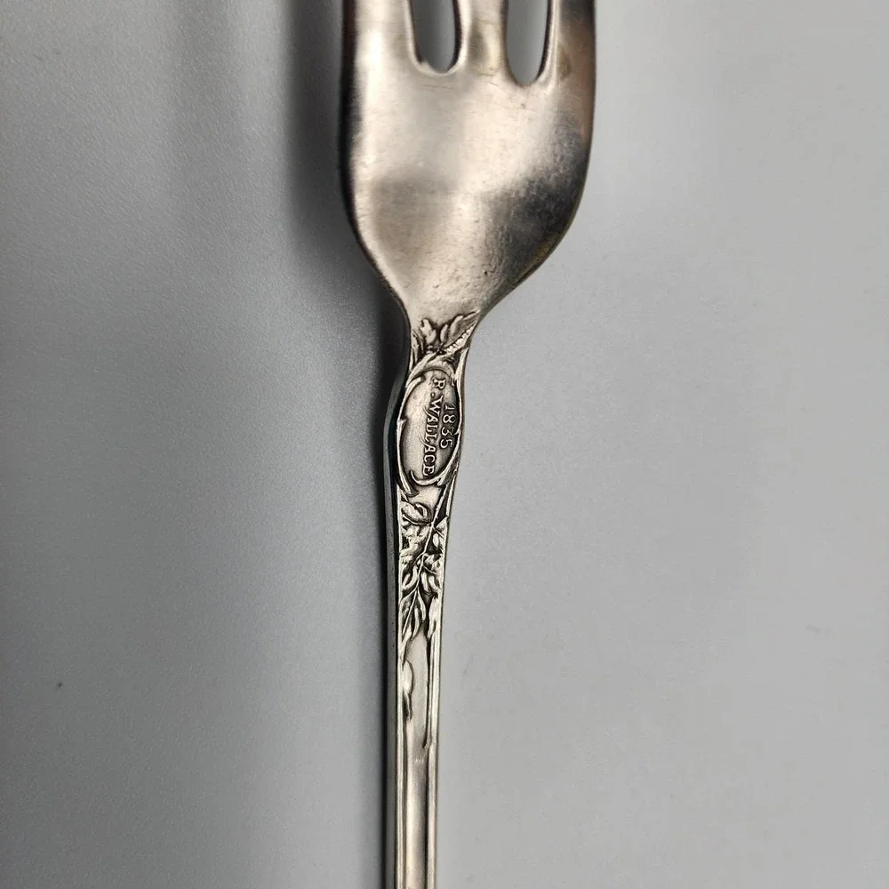 Silver serving fork by R. Wallace 1835 A1 Blossom pattern 8.75